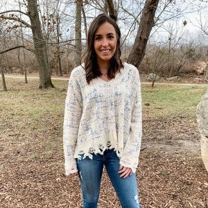 Fringed V-neck sweater